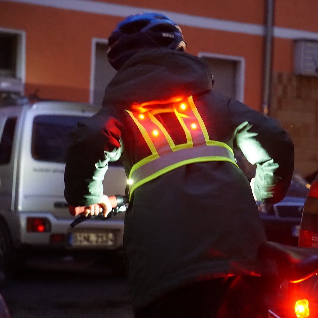 LED Warnweste für Kinder – Kind auf Fahrrad, Rückenansicht